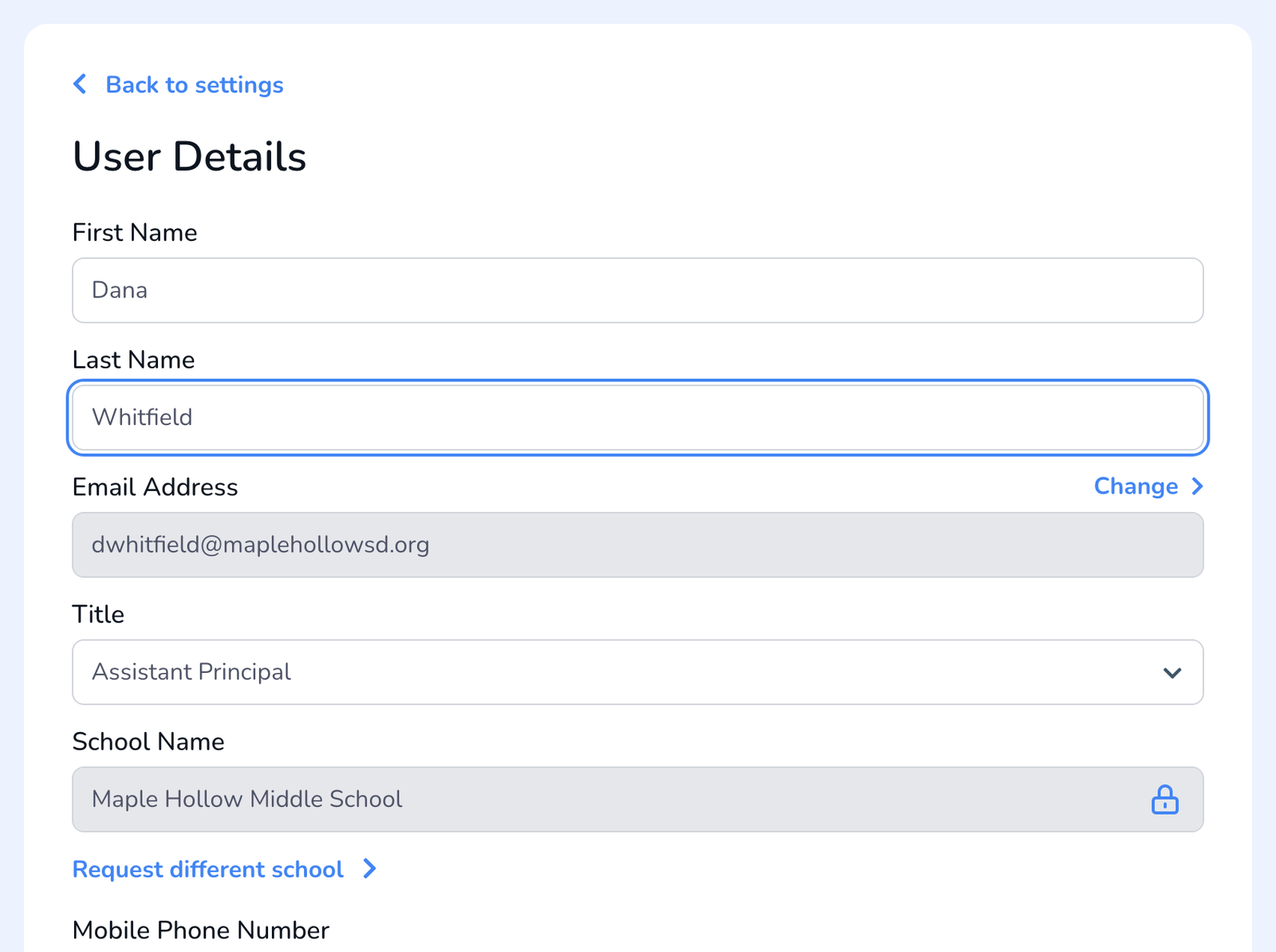 The User Details panel in Settings, with the locked School Name field and a Request different school link underneath it.